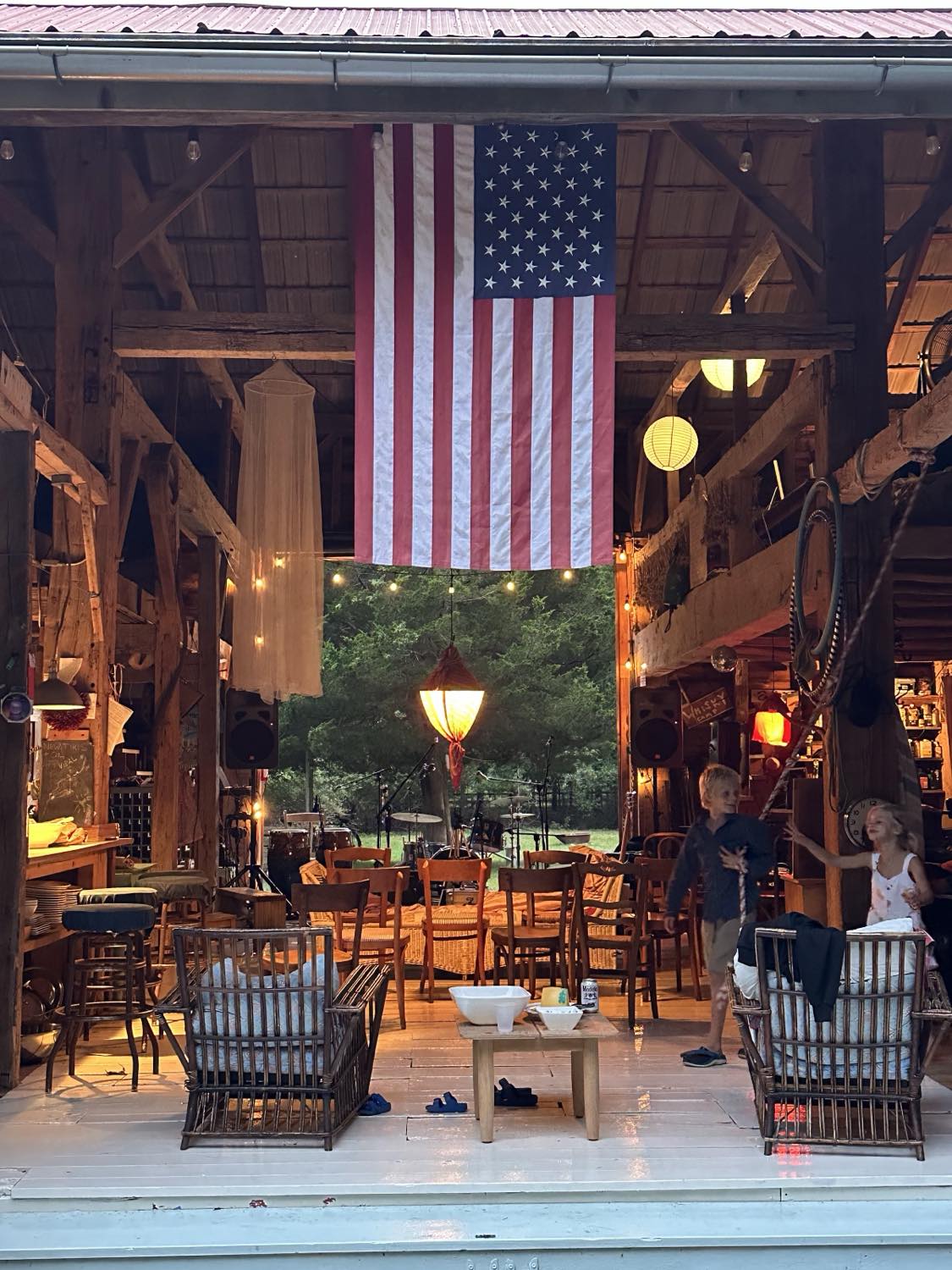 The barn at golden hour with lanterns lit